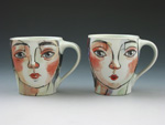 2 Faces Mugs